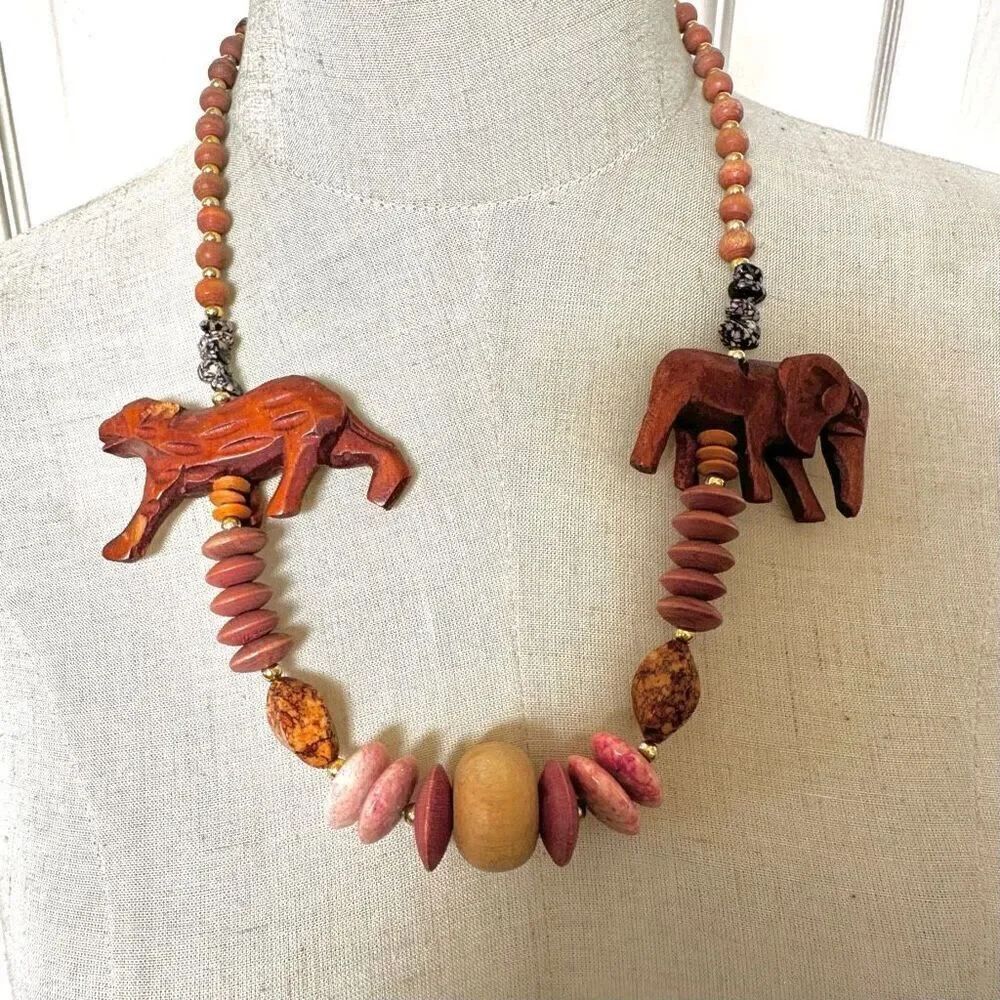 Exotic wood beaded animal statement necklace